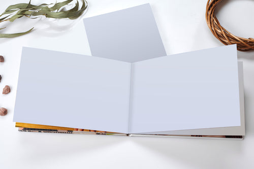 Extra pages for your Signature Photobook — blank open spread